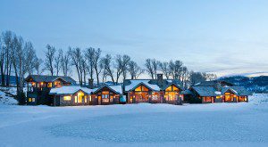 Luxury Jackson Hole Home for Sale in Snow During Evening